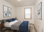 Thumbnail 3 of 19 - Grand Forks, ND Bristol Park Apartments. a bedroom with a bed and a window
