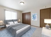Thumbnail 3 of 11 - Grand Forks, ND Carling Manor Apartments.  a bedroom with a bed and two nightstands