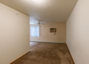 Thumbnail 13 of 17 - Grand Forks, ND Creekside Apartments. A bedroom area of a studio apartment.