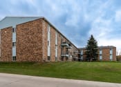 Thumbnail 19 of 19 - Grand Forks, ND Grandview Apartments. Exterior of a brick apartment.