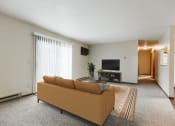 Thumbnail 3 of 28 - a living room with a couch and a tv  at Harrison and Richfield, Grand Forks, 58201