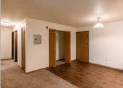 Thumbnail 15 of 22 - Grand Forks, ND Southview Apartments.  A dining room with a entry door and a closet.