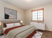 Thumbnail 6 of 19 - a bedroom with a bed and a window  at Sterling Pointe, Grand Forks, 58201