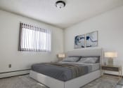 Thumbnail 3 of 27 - .  Grand Forks, ND Sunview apartments.  a bedroom with a bed and two night stands with a window