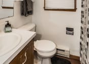 Thumbnail 6 of 6 - Grand Forks, ND Valley Home Duplex. a bathroom with a toilet sink and shower