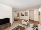 Thumbnail 1 of 18 - a living room with a couch and a tv. Hutchinson, MN Twin Oaks