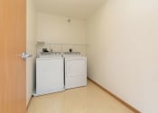 Thumbnail 9 of 21 - a laundry room with a washer and dryer.Fargo, ND Sunrise North