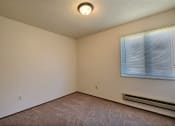 Thumbnail 9 of 18 - a bedroom with a large window