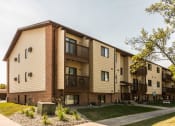 Thumbnail 18 of 20 - Grand Forks, ND Library Lane Apartments. Exterior of the three level building