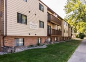 Thumbnail 19 of 20 - Grand Forks, ND Library Lane Apartments exterior with sidewalk