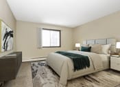 Thumbnail 5 of 32 - Georgetown on the River Apartments, Fridley, MN, 55432. A bedroom with a bed and a dresser.