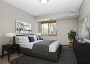 Thumbnail 26 of 32 - Georgetown on the River Apartments, Fridley, Minnesota. A bedroom with a bed and two night stands.