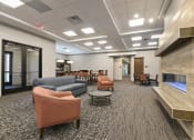 Thumbnail 27 of 32 - Montreal Courts Apartments in Little Canada, MN | Community Room Lounge