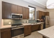 Thumbnail 20 of 32 - Montreal Courts Apartments in Little Canada, MN | Community Room