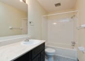 Thumbnail 11 of 32 - Montreal Courts Apartments in Little Canada, MN | Bathroom