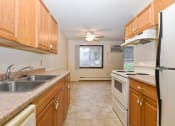Thumbnail 5 of 32 - Montreal Courts Apartments in Little Canada, MN| Kitchen