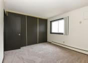Thumbnail 15 of 32 - Montreal Courts Apartments in Little Canada, MN | Bedroom