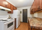 Thumbnail 13 of 32 - Montreal Courts Apartments in Little Canada, MN | Kitchen
