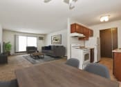 Thumbnail 2 of 13 - Sage Park Apartments in New Brighton, MN | living room and kitchen area