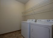 Thumbnail 22 of 25 - North Sky Apartments | Laundry Room