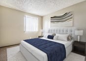 Thumbnail 6 of 29 - Omaha, NE Stony Brook Townhomes. A bedroom with a bed and a window