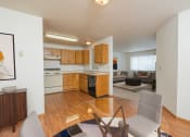 Thumbnail 3 of 20 - Fargo, ND Park Circle Apartments. a kitchen and living room in a 555 waverly unit