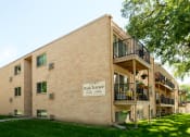 Thumbnail 2 of 2 - the exterior of a three level building. Fargo, ND Park Terrace Apartments