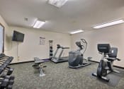 Thumbnail 24 of 26 - Prairiewood Meadows Apartments | Fitness Center