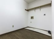 Thumbnail 12 of 25 - Grand Forks Primrose Apartments. an empty closet with washer and dryer hookups