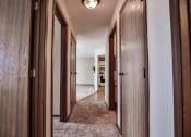 Thumbnail 14 of 25 - Grand Forks Primrose Apartments. a hallway to bedrooms and a bathroom