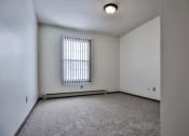 Thumbnail 19 of 25 - Grand Forks Primrose Apartments. small empty room with a large window