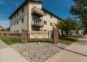 Thumbnail 27 of 28 - an apartment building with a sign  at Harrison and Richfield, Grand Forks, ND