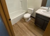 Thumbnail 25 of 28 - a bathroom with a toilet and a sink and a bath tub. Fargo, ND Sheyenne Terrace