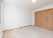 Thumbnail 11 of 16 - Sierra Ridge Apartments in Bismarck, ND | 2 Bdrm-Plan D-Bedroom