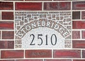 Thumbnail 31 of 31 - Stonebridge 2510 is etched into this brick wall. Fargo, ND Stonebridge Apartments