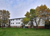 Thumbnail 16 of 17 - An exterior or a three level apartment. Fargo, ND Southgate Apartments