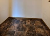 Thumbnail 8 of 10 - the closet of an empty room with a shelf on the wall. Fargo, ND Sterling Park Apartments