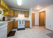 Thumbnail 7 of 43 - Stonebridge Apartments | 1 Bedroom Plan B | Kitchen | Dining