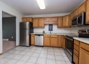 Thumbnail 10 of 43 - Stonebridge Apartments | 2 Bedroom Plan G | Kitchen | Dining
