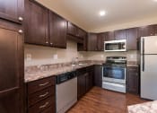 Thumbnail 5 of 11 - Bismarck, ND Stonefield Townhomes | Kitchen