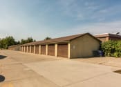 Thumbnail 27 of 27 - Grand Forks, ND Sunview apartments. a row of garages in front of a building