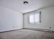 Thumbnail 18 of 27 - Grand Forks, ND Sunview apartments. a large empty room with a large window