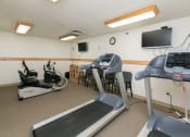 Thumbnail 15 of 21 - a fitness center with treadmills. Fargo, ND Sunrise North