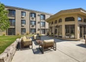 Thumbnail 26 of 30 - The Edge of Uptown Apartments | Patio with Furniture
