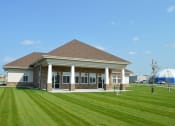 Thumbnail 41 of 45 - a building with a lawn in front of it. Fargo, ND Urban Plains Apartments