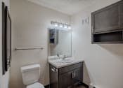 Thumbnail 41 of 49 - a bathroom with a sink and toilet. Fargo, ND Lake Crest Apartments