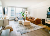 Thumbnail 1 of 30 - Living Room with brown couch at 21 E Chestnut, Chicago, Illinois, 60611