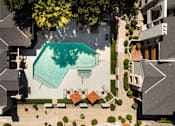 Thumbnail 31 of 36 - an aerial view of a house with a swimming pool in the middle