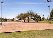 Thumbnail 36 of 36 - a volleyball court in the middle of a park