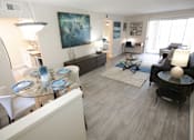 Thumbnail 4 of 25 - a view of a living room and dining room from the kitchen